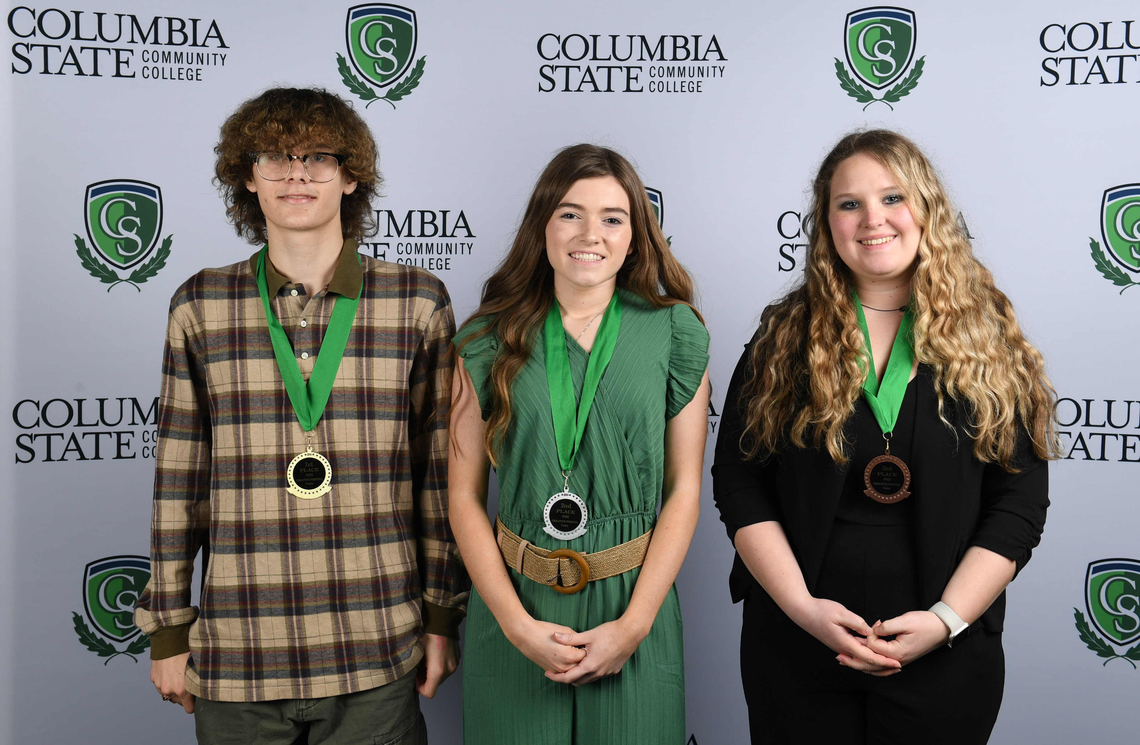 Creative Writing – Poetry Winners (left to right): First place winner, Calen Hood of Spring Hill High School; second place winner, Toni Calton of Collinwood High School; and third place winner, Helayna Garlett of Spring Hill High School.