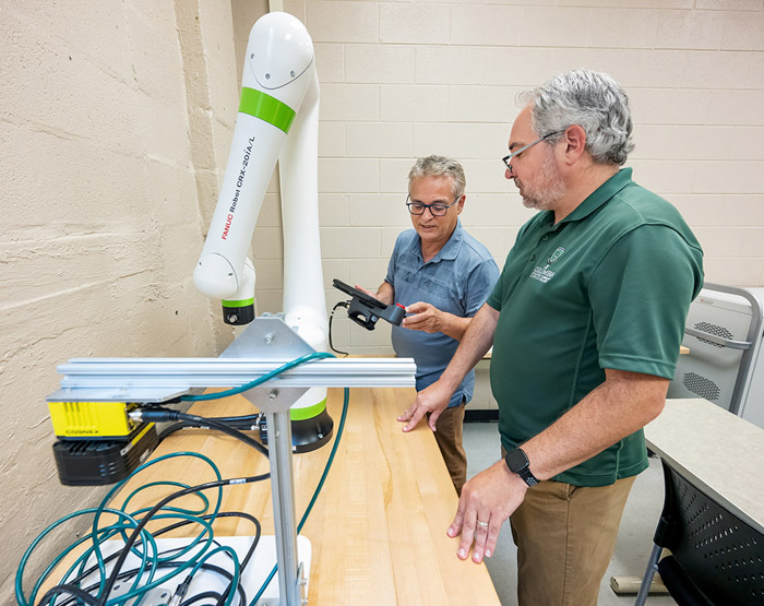 Dr. Mehran Mostajir, Columbia State dean of the Business and Technology Division and Patrick McElhiney, Columbia State director of grants and development officer.