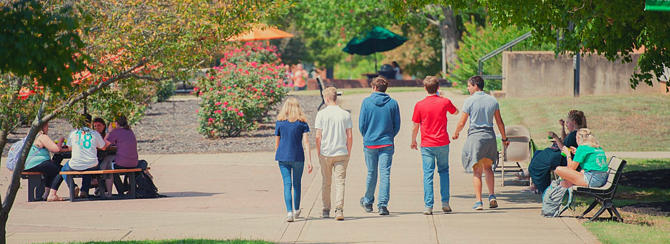 Columbia Campus in spring with students walking around