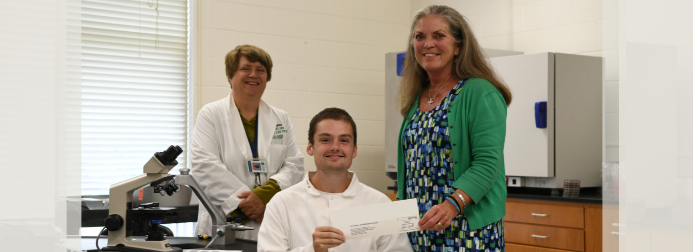 Pictured (left to right): Lisa Harmon, Columbia State program director and assistant professor of medical laboratory technology; Columbia State student and American Medical Technologists scholarship recipient Noah Wright; and Dr. Kae Fleming, Columbia State dean of Health Sciences Division and professor of radiologic technology.