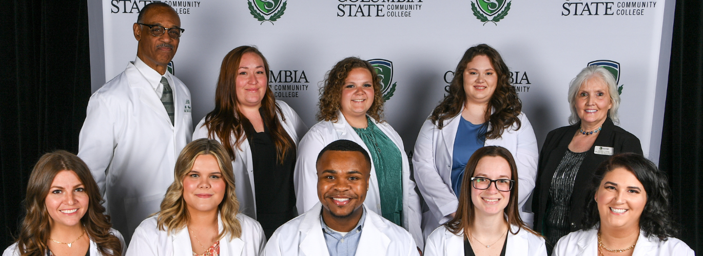 Pictured: Columbia State Spring 2023 Respiratory Care graduates (standing, left to right): Roger Major, Columbia State clinical director and associate professor of respiratory care; Sasha Foster; Lindsey Davis; Vanessa Bowlus and Cindy Smith, Columbia State program director and assistant professor of respiratory care. (Sitting, left to right): Lauren Rice, Alexis Underwood, William Owens, Katie Dunn and Juliann Barnes.