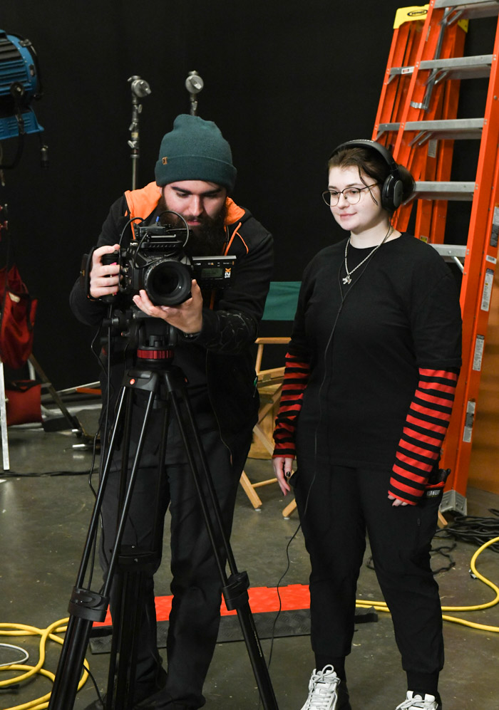 Pictured (left to right): Nicholas Schultz and Amanda Little setting up equipment to conduct interviews at the Veterans History Project hosted by Columbia State Community College.