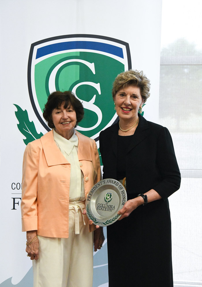 Dr. Janet F. Smith, Columbia State president, presents Lynda Crunk Potts with the President’s Award of Honor for Distinguished Alumni.