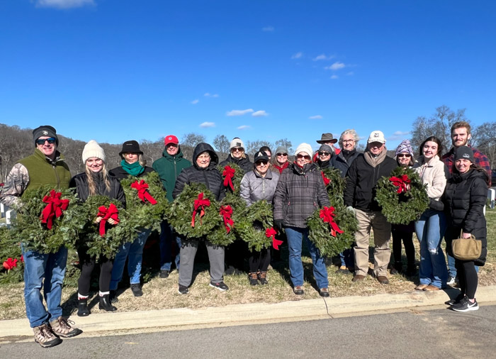 Members of Columbia State Community College’s chapter of Phi Theta Kappa at the Middle Tennessee State Veterans Cemetery for National Wreaths Across America Day.