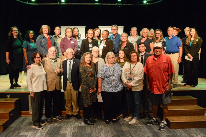 Dr. James Senefeld (bottom row, second from the left) is joined by current and retired Columbia State faculty and staff.