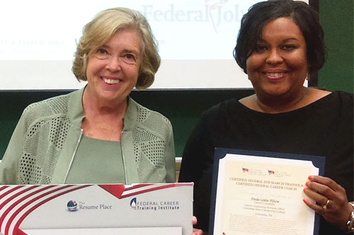 Freda Pillow receives her federal award.