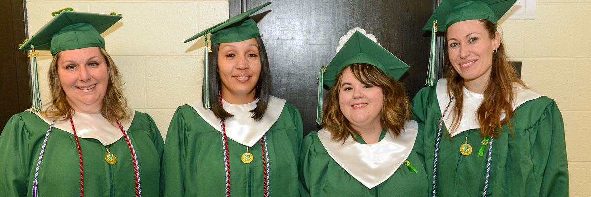 several smiling graduates